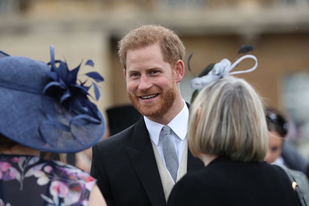 Britain's Prince Harry, Duke of Sussex meets guests at the Queen's Garden Party