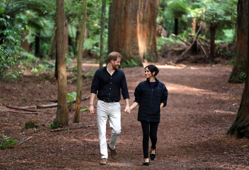 Prince Harry and Meghan Markle walking through Redwoods