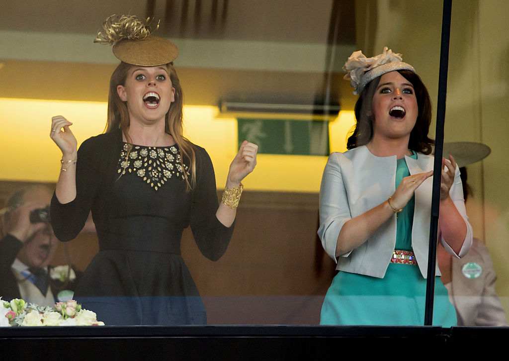 Princess Beatrice and Princess Eugenie cheer Queen Elizabeth II's horse