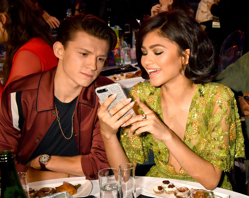 Actors Tom Holland (L) and Zendaya