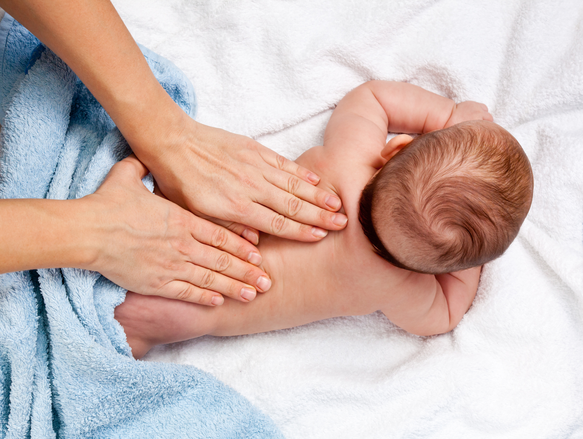 Baby getting a back massage