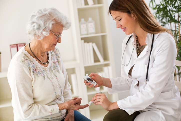 Senior patient getting a blood sugar test