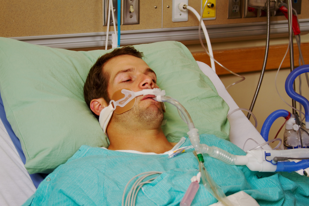Man in hospital bed