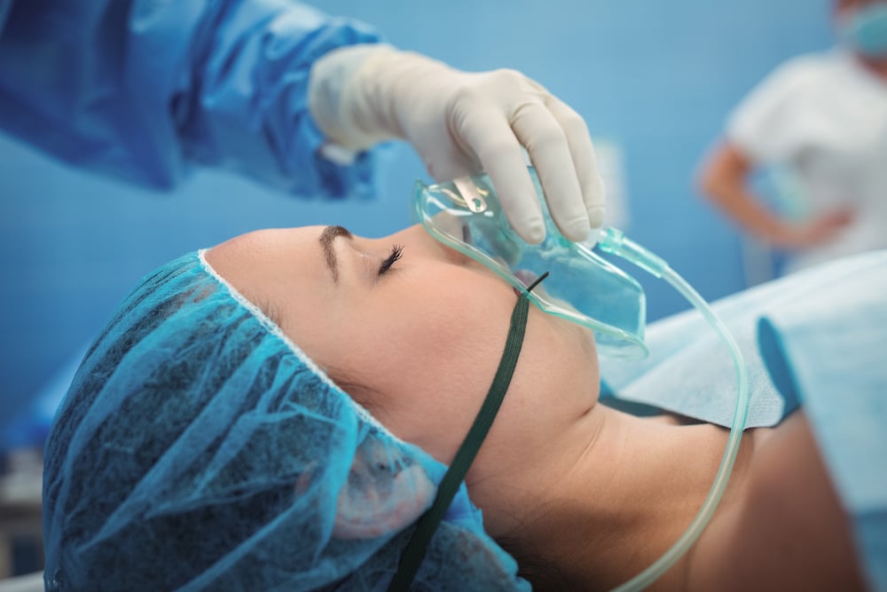 Patient wearing an oxygen mask