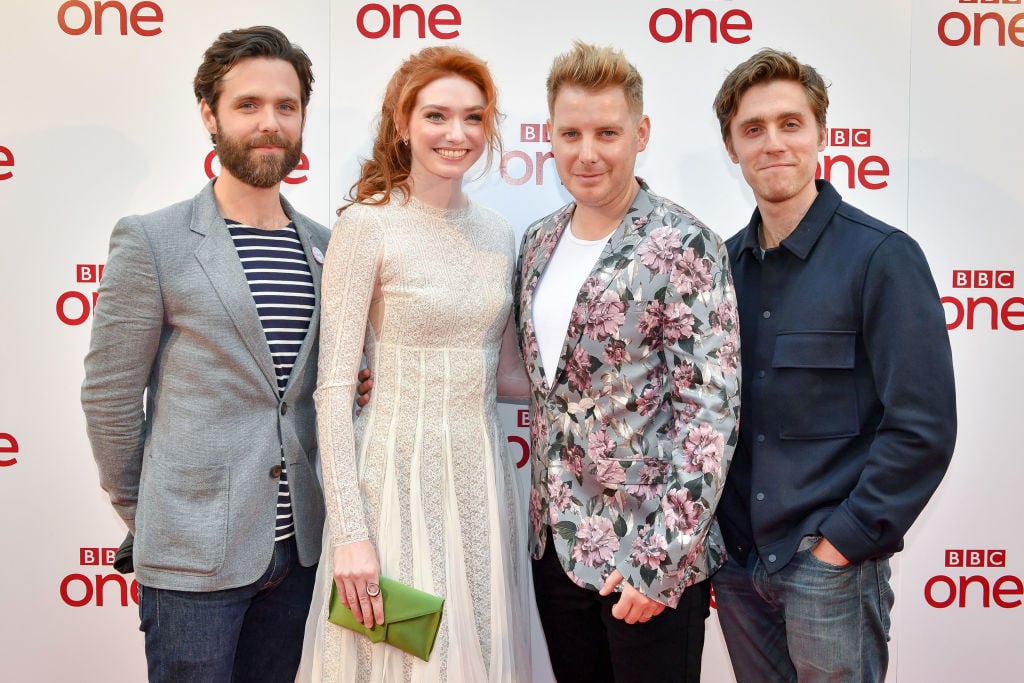Luke Norris (left) with 'Poldark' cast mates | Ben Birchall/PA Images via Getty Images