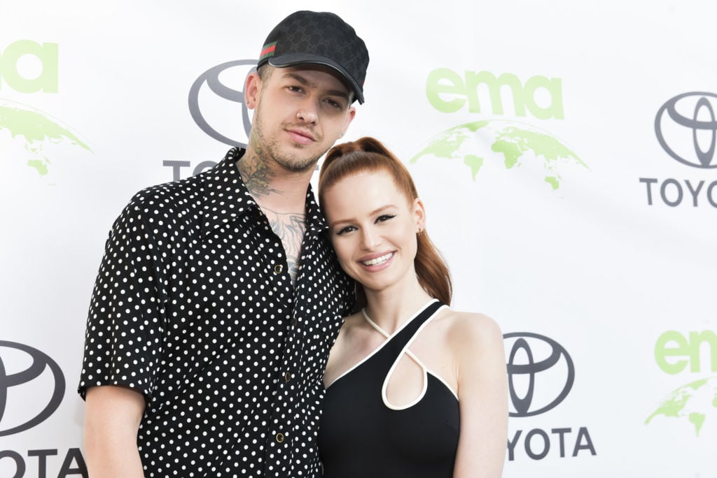 Actors Madelaine Petsch and Travis Mills