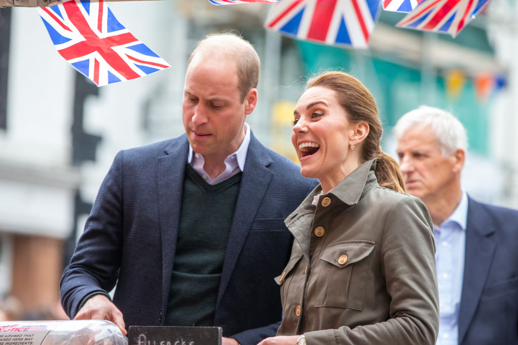 Prince William, Duke of Cambridge and Catherine, Duchess of Cambridge meet members of the public they visit Keswick Market