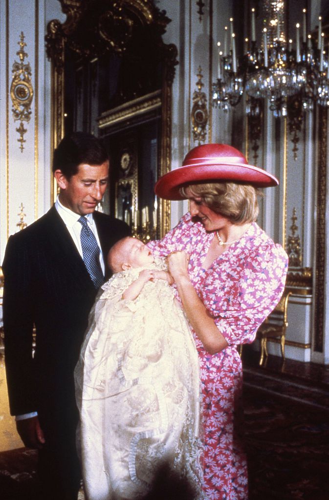 Prince Charles, Princess Diana, and Prince William at christening