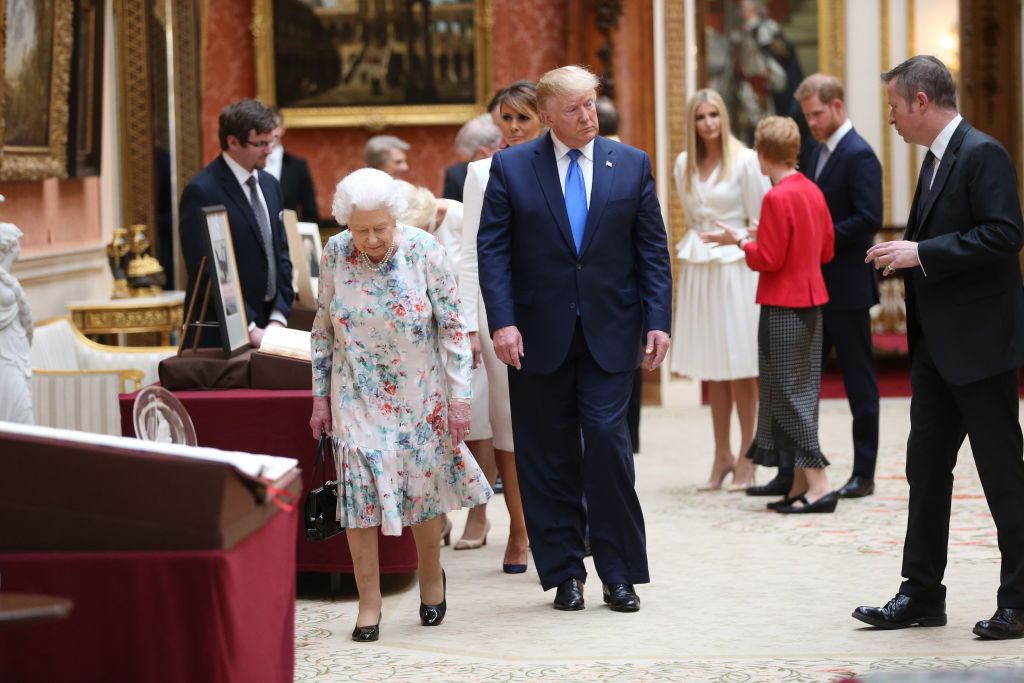 Prince Harry appeared to stay far away from Donald Trump as he met with Queen Elizabeth