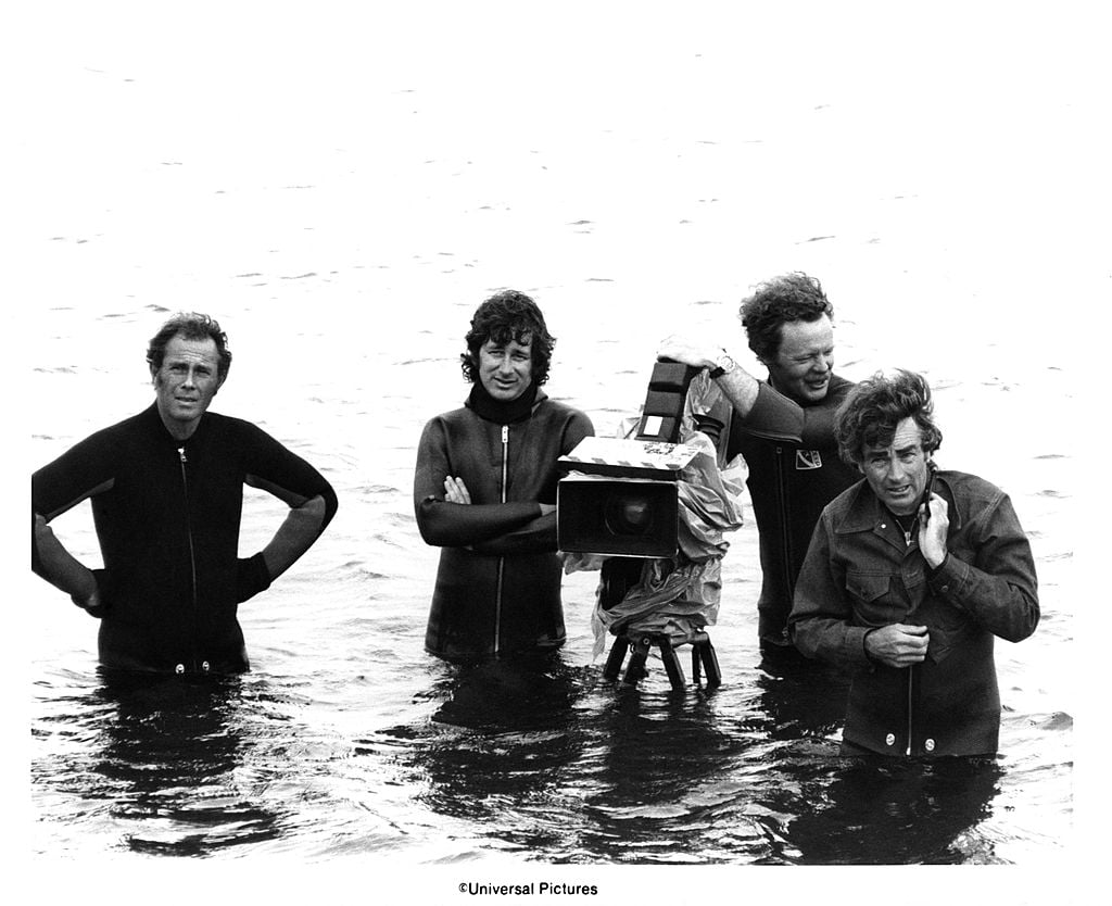 (L-R) [unidentified], Director Steven Spielberg, camera operator Michael Chapman and cinematographer Bill Butler on the set of the Universal Pictures production of 'Jaws' in 1975 in Martha's Vineyard, Massachusetts.