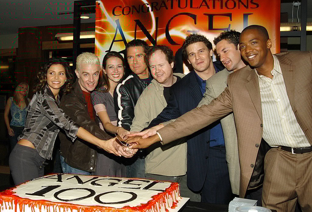 (L-R): Charisma Carpenter, James Marsters, Amy Acker, Alexis Denisof, Joss Whedon, David Boreanaz, Andy Hallett, J. August Richards