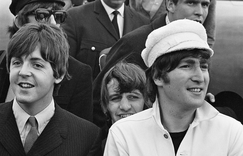 beatles leaving an airplane 1965