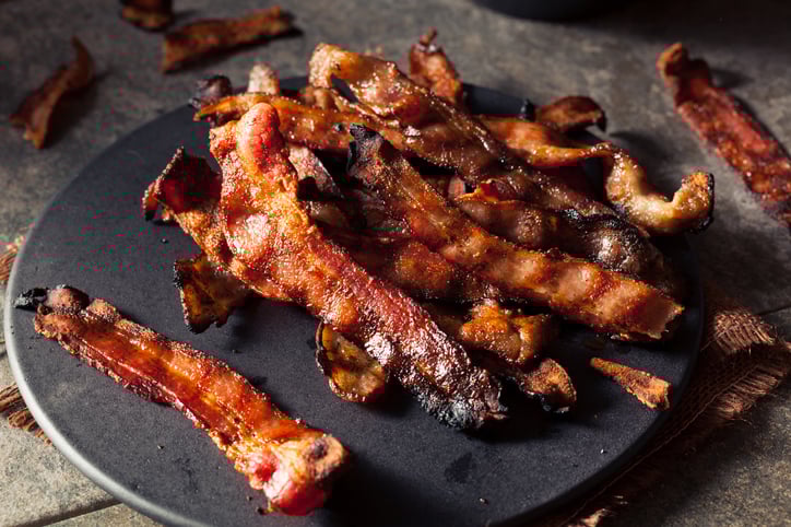 Well done bacon on a plate