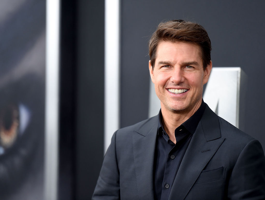 Tom Cruise attends a premiere.