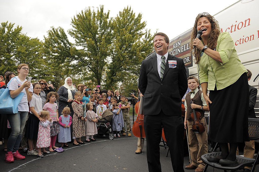 Jim Bob Duggar, center, and his wife, Michelle Duggar