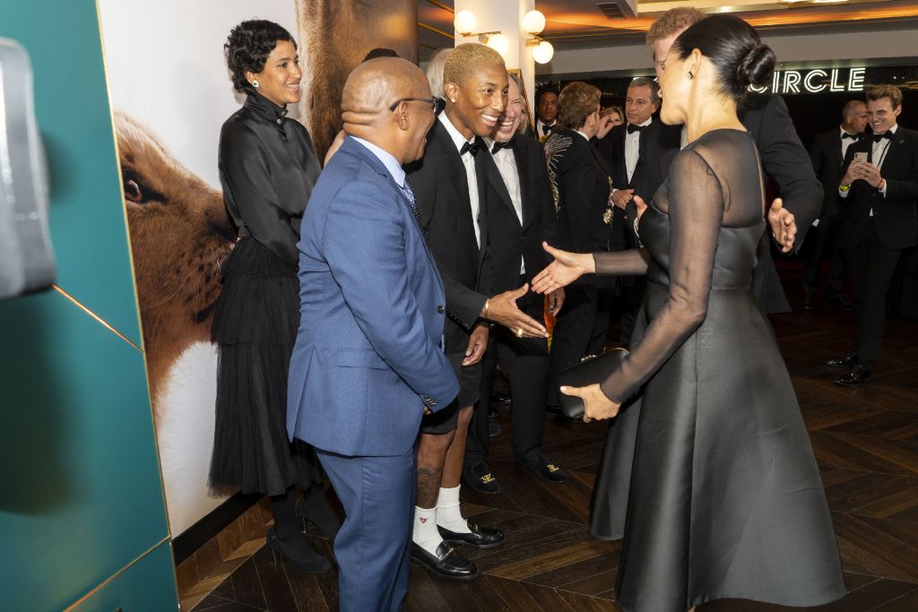 Prince Harry and Meghan Markle meet Pharrell