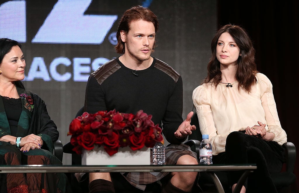 Author Diana Gabaldon and actors Sam Heughan and Caitriona Balfe | Frederick M. Brown/Getty Images