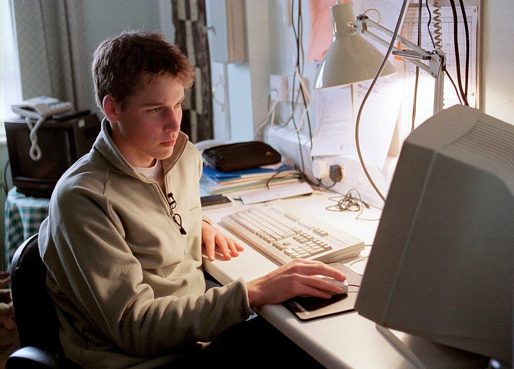 Prince William Using His Computer At His Desk At Eton College Boarding School