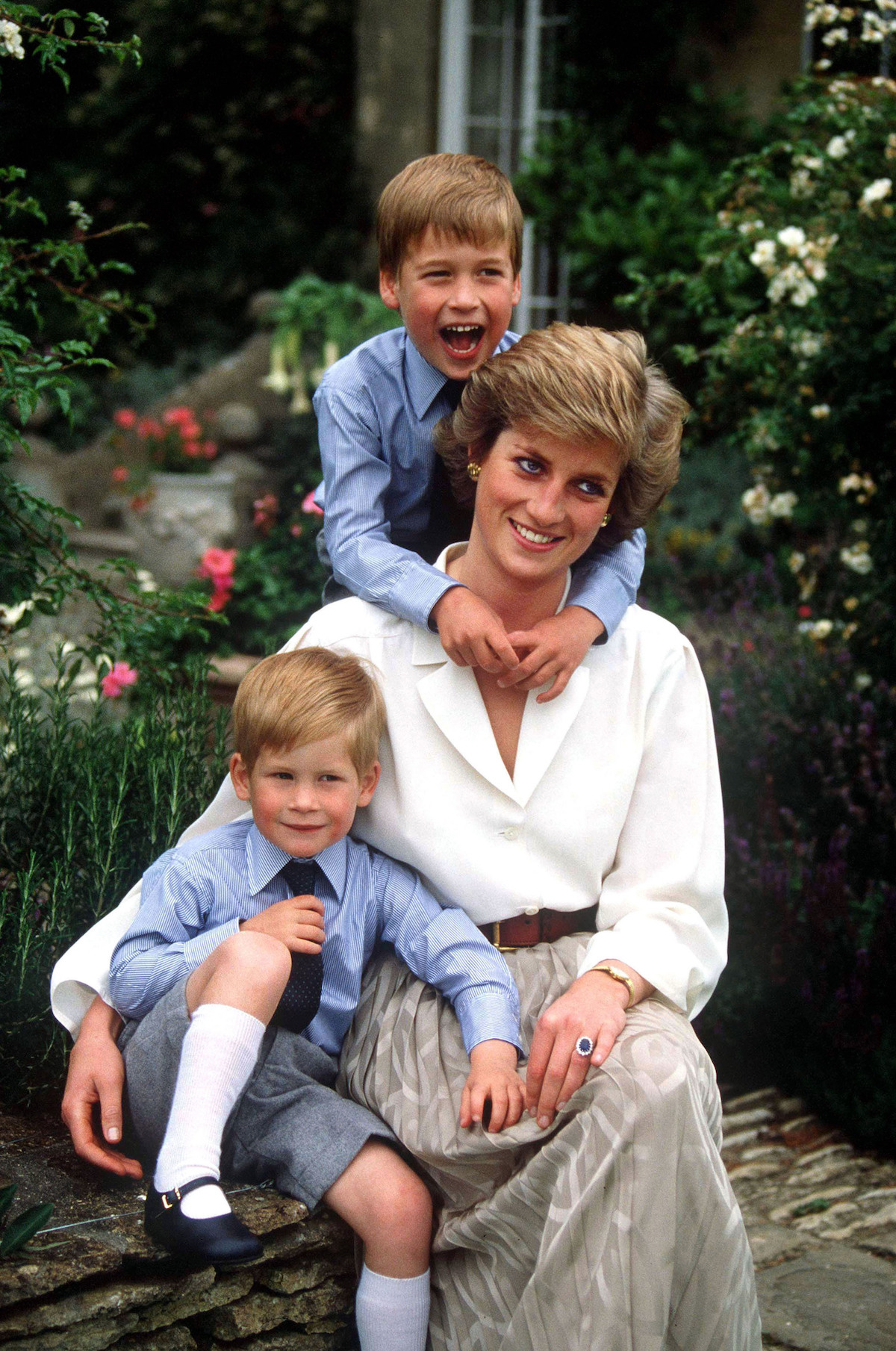 Prince Harry with Princess Diana and Prince William. 
