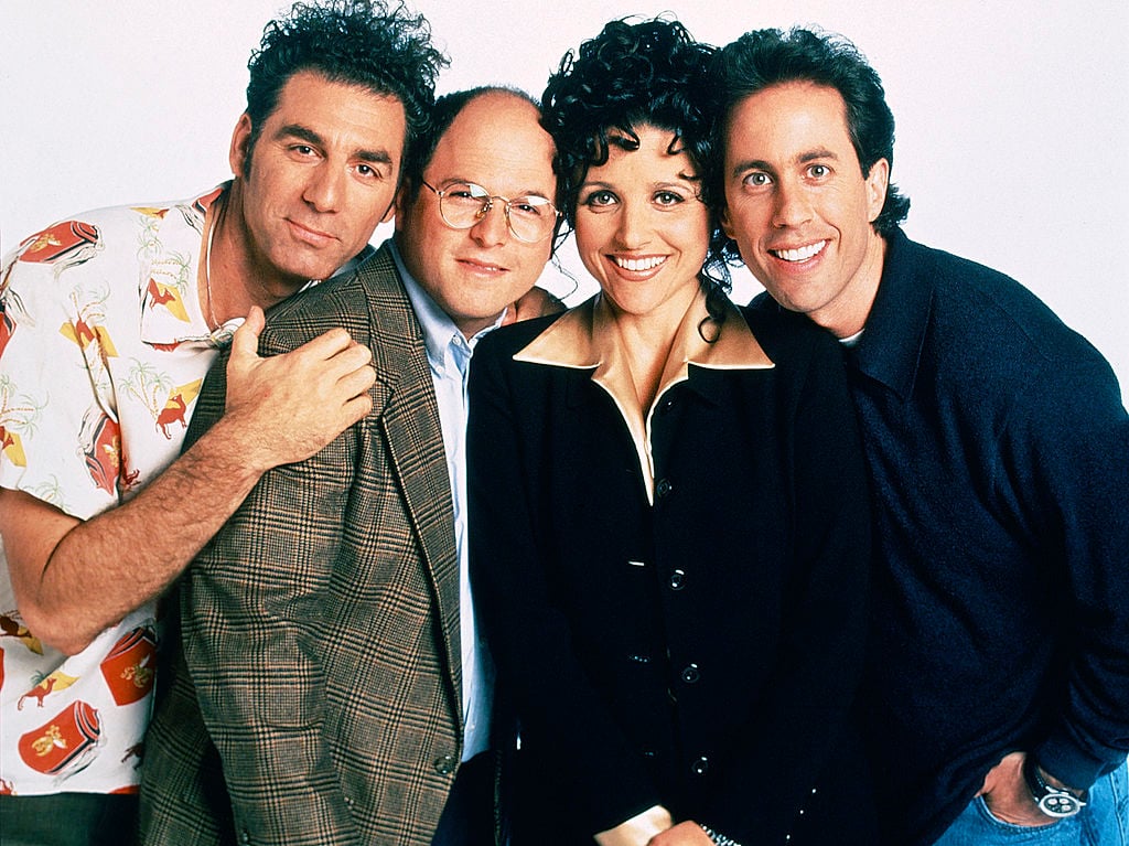 Michael Richards as Cosmo Kramer, Jason Alexander as George Costanza, Julia Louis-Dreyfus as Elaine Benes, Jerry Seinfeld as Jerry Seinfeld.