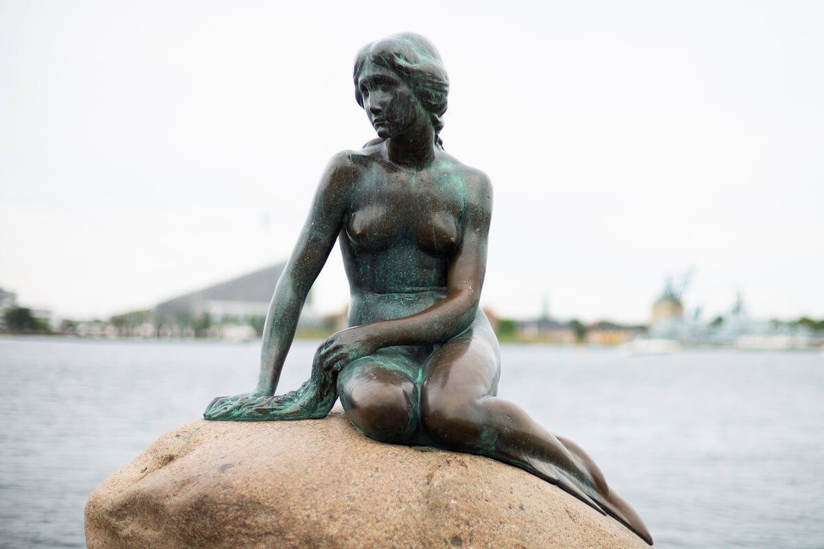 'The Little Mermaid' statue in Denmark, honoring the original Little Mermaid story by Hans Christian Andersen