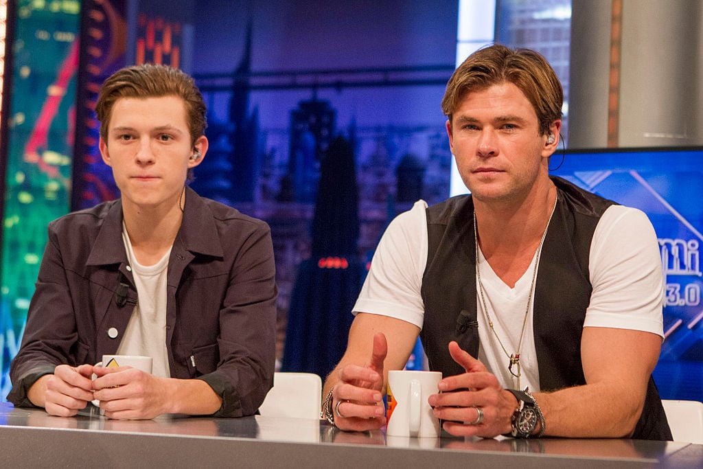 Tom Holland (L) and Chris Hemsworth (R)