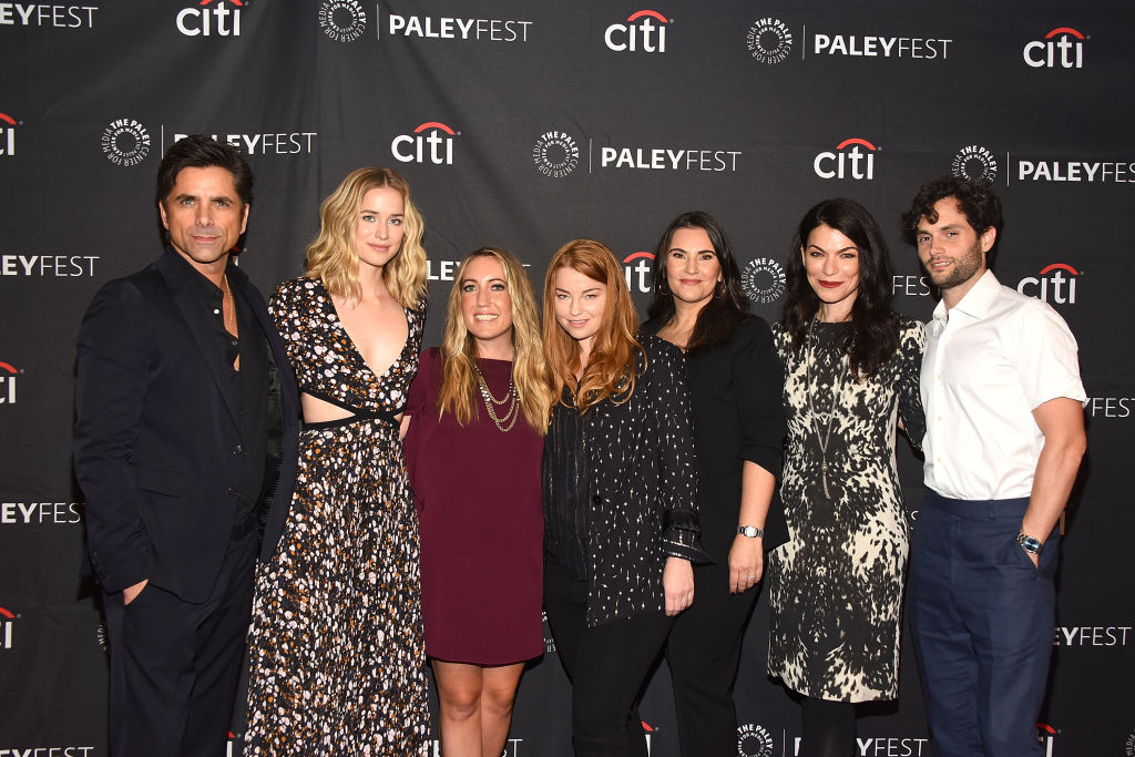 BEVERLY HILLS, CA - SEPTEMBER 09: John Stamos, Elizabeth Lail, Caroline Kepnes, Sarah Schechter, Gina Girolamo, Sera Gamble and Penn Badgley