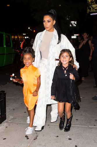 Kim Kardashian with North and Penelope