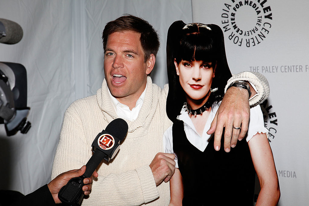 Michael Weatherly with a cardboard cutout of Pauley Perrette | Brian To/FilmMagic