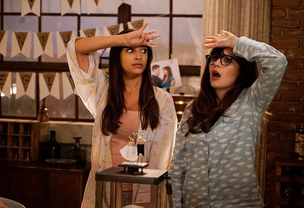 Hannah Simone and Zooey Deschanel playing True American in an episode of 'New Girl'