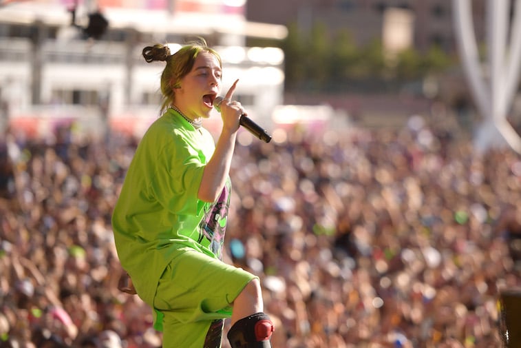 Billie Eilish performs a song onstage.
