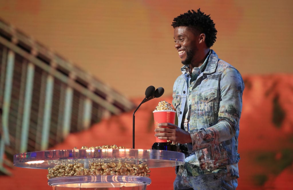 Chadwick Boseman accepting an award for Black Panther at the MTV Movie and TV awards
