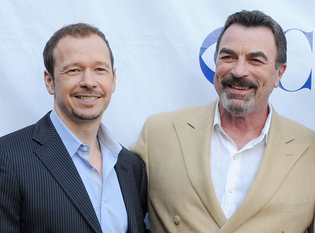 Donnie Wahlber and Tom Selleck | Gregg DeGuire/WireImage