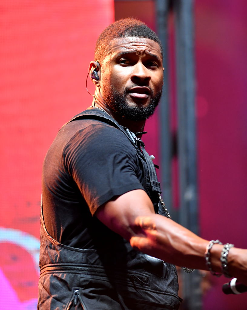 Usher performing