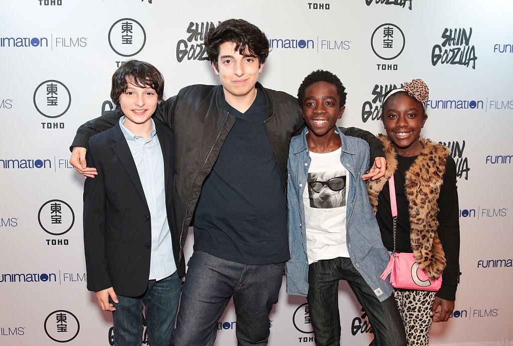 Nick Wolfhard with members of the Stranger Things cast, including brother Finn Wolfhard