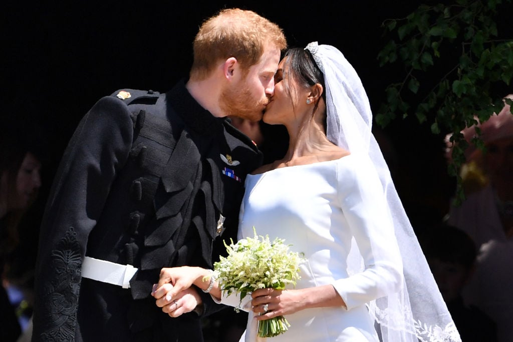 Prince Harry and Meghan Markle kiss on their wedding day.