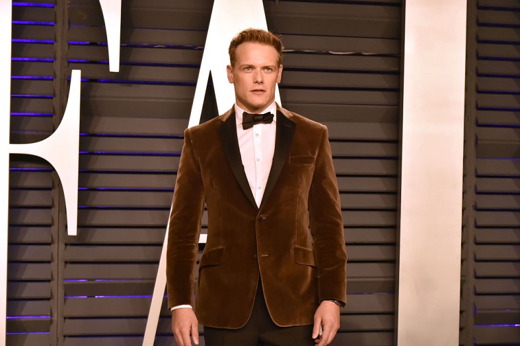 Sam Heughan attends an event