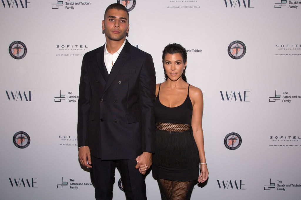 (L)Younes Bendjima and (R) Kourtney Kardashian attend a benefit together
