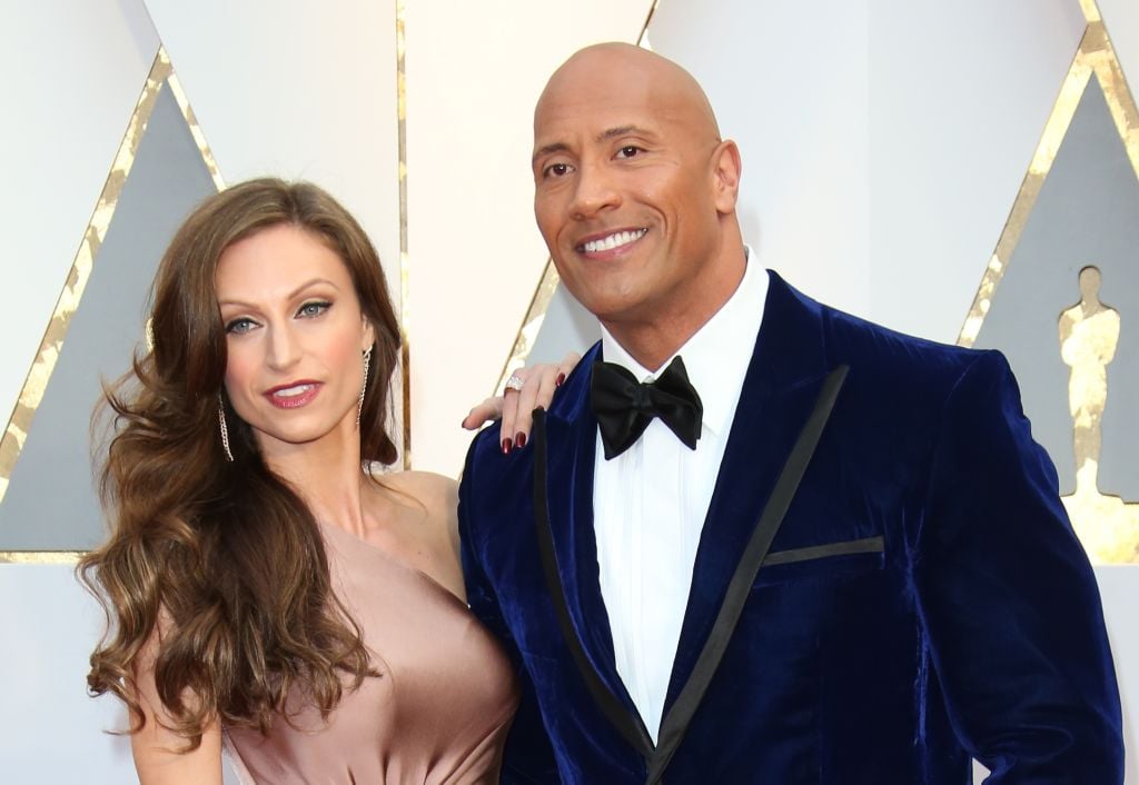 Lauren Hasian (L) and Dwayne Johnson (R) attend the 89th Academy Awards in 2017.
