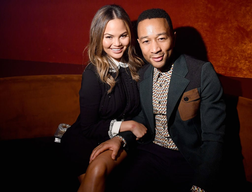 Chrissy Teigen and John Legend at a Paris Fashion Week aftershow party.