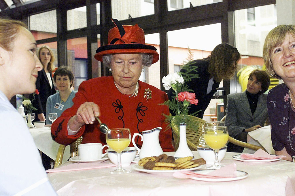 Queen Elizabeth eating
