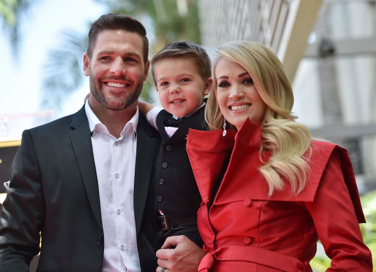Carrie Underwood with Mike and Isaiah Fisher