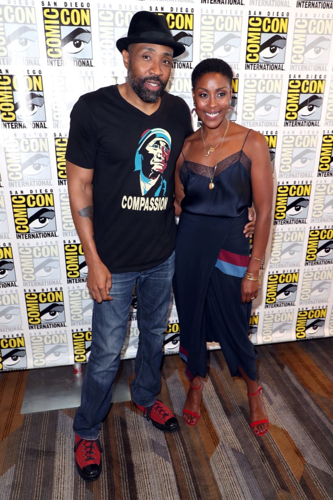 Cress Williams and Christine Adams promoting Black Lightning at Comic Con 201