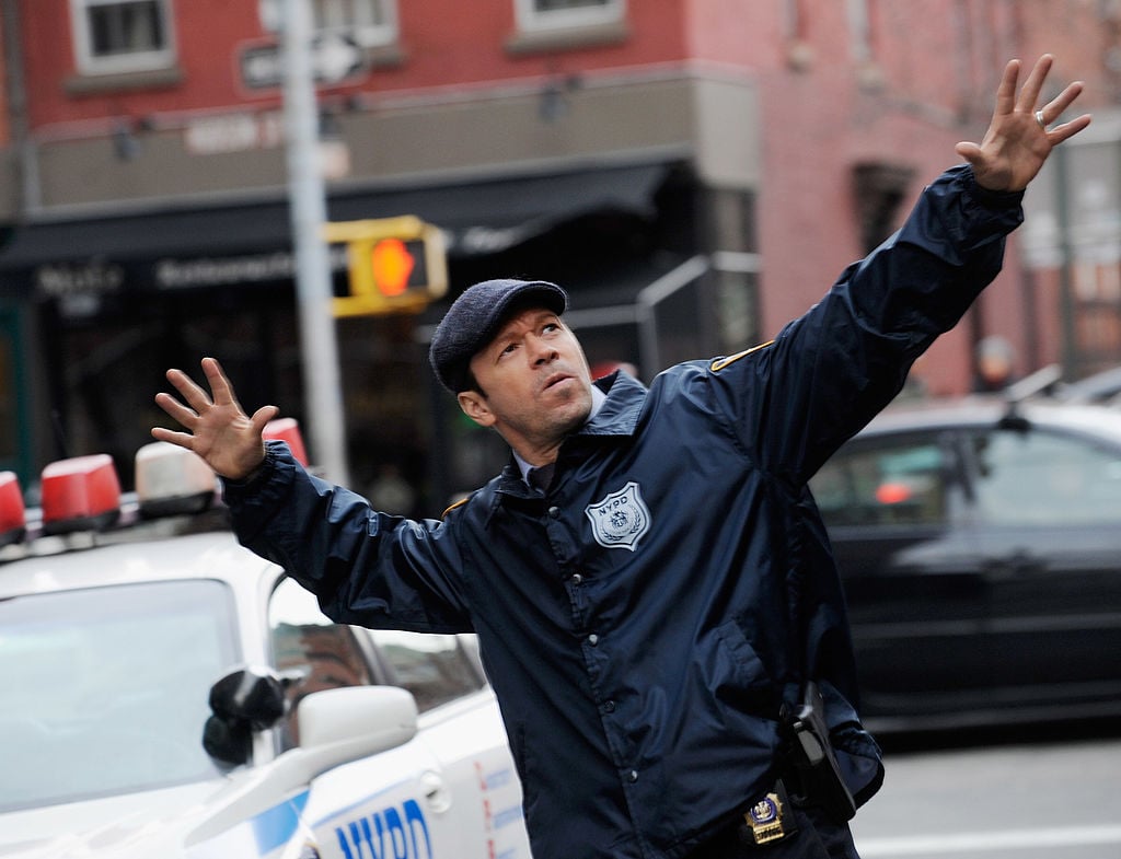 Donnie Wahlberg filming on location for "Blue Bloods" in 2013 in New York City | Bobby Bank/WireImage