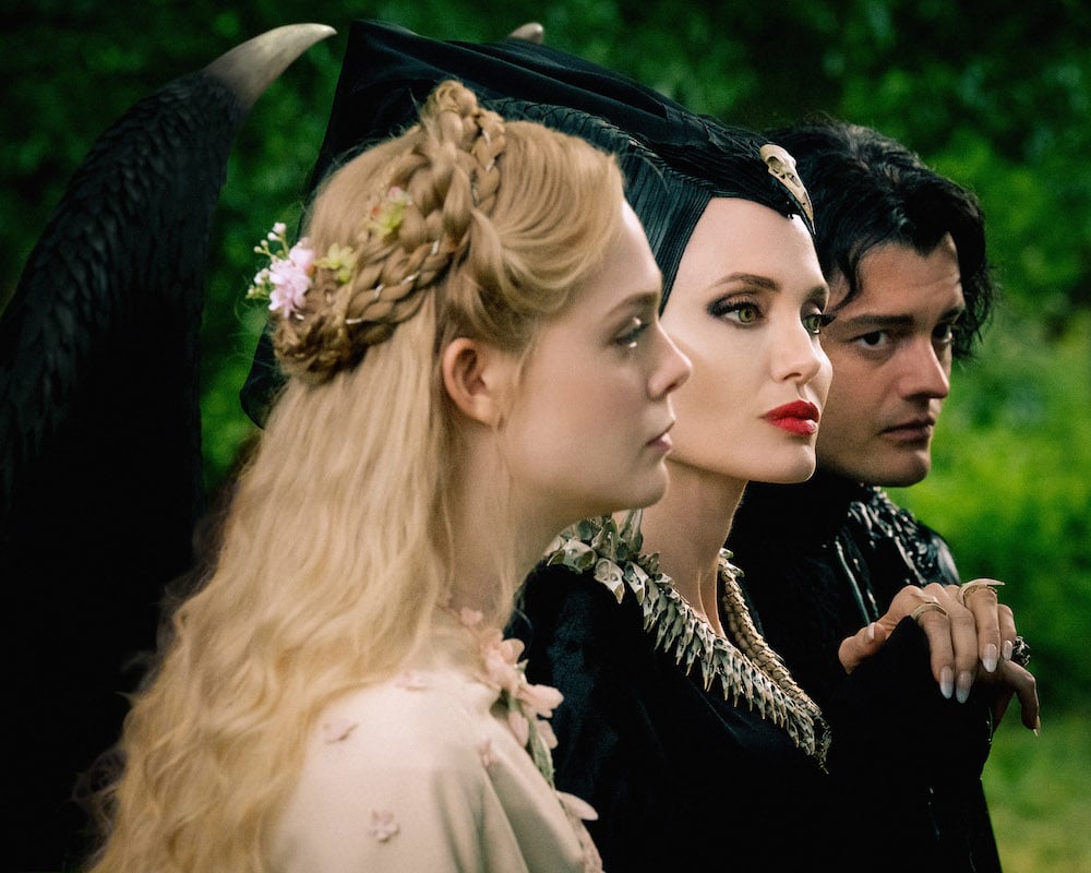 Elle Fanning, Angelina Jolie and Sam Riley