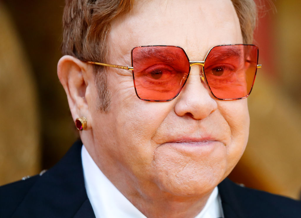 Elton John attends "The Lion King" European Premiere