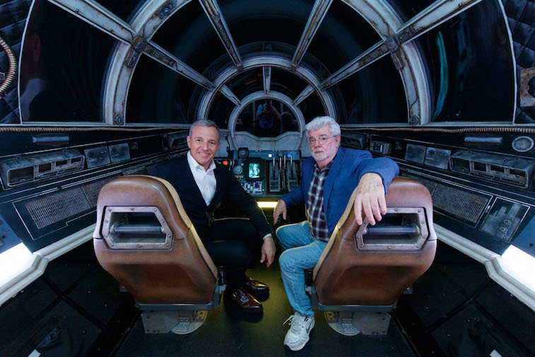 Bob Iger and George Lucas on the Millennium Falcon