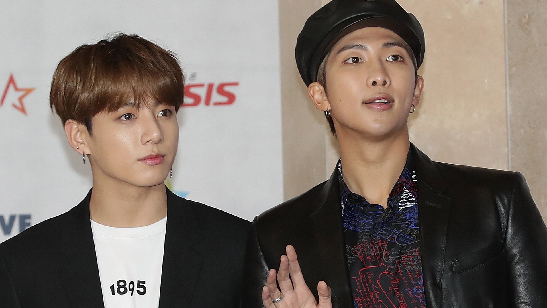 Jungkook and RM of BTS at 2018 Asia Artist Awards on November 28, 2018