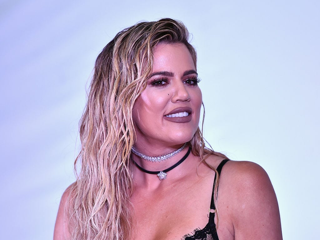 Khloe Kardashian speaks onstage at an event