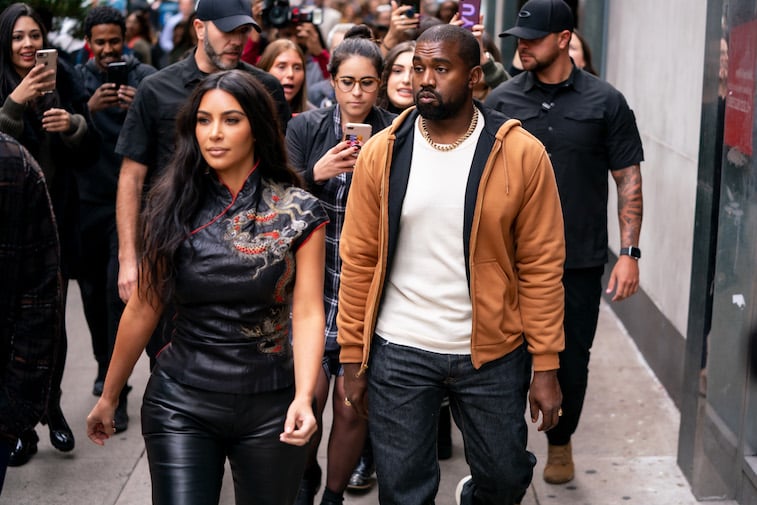 im Kardashian and Kanye West walk down the street in New York